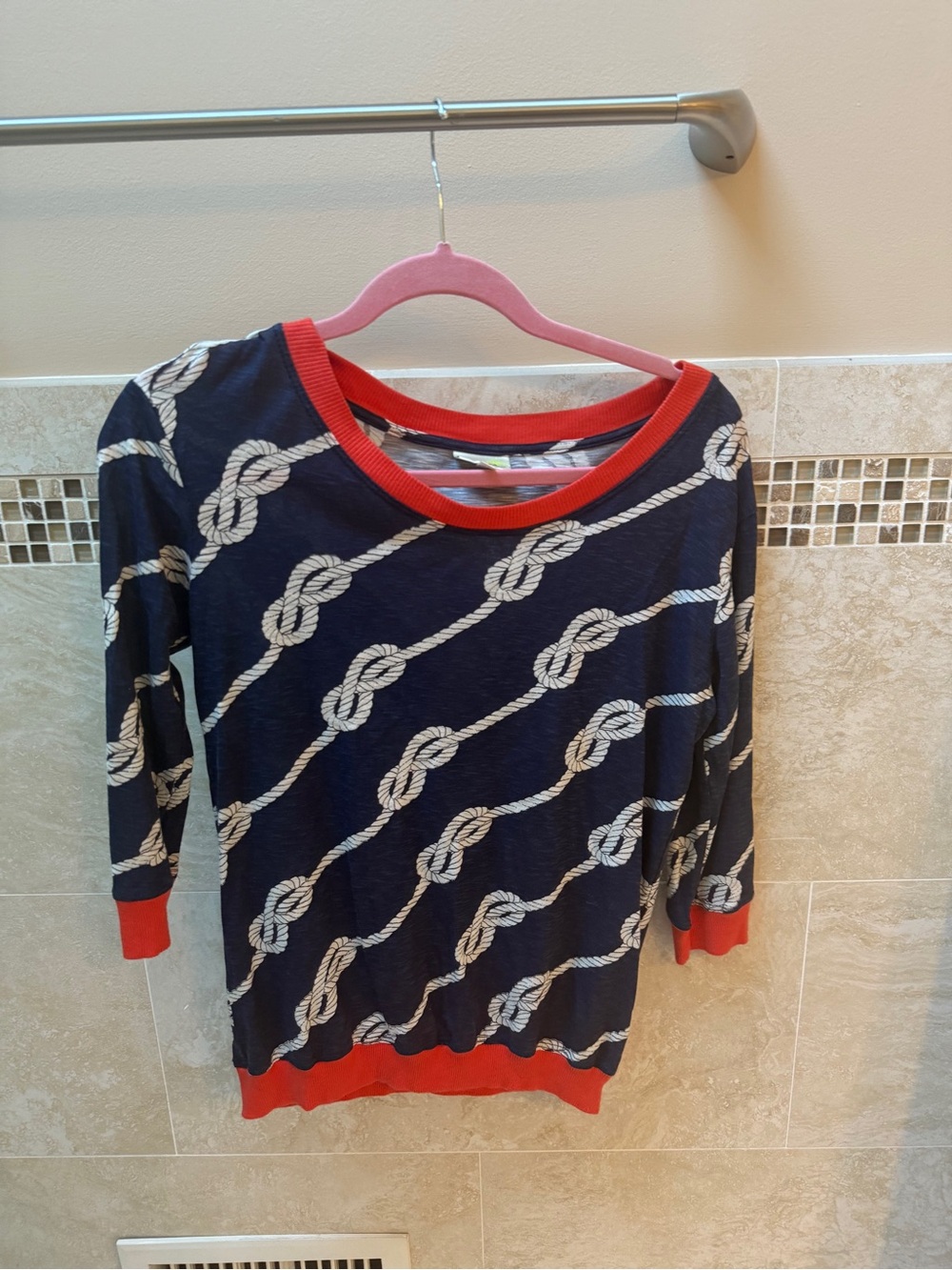 Navy blue and red nautical sweater with rope pattern